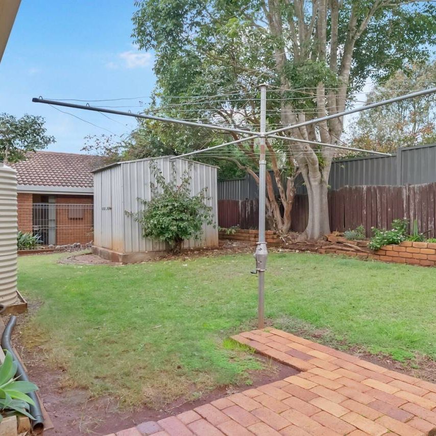 Low-Maintenance Brick Unit in Prime Centenary Heights Location - Photo 1