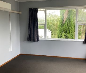 This two-bedroom unit offers comfortable, low-maintenance living in... - Photo 4