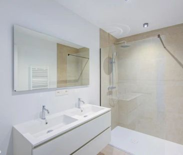 NIEUWBOUWAPPARTEMENT MET 2 SLAAPKAMERS, OVERDEKT TERRAS EN ONDERGRO... - Photo 5