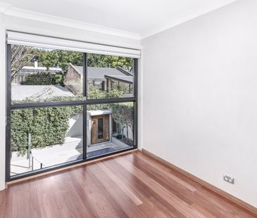 Contemporary Low-Maintenance Home with Pool in Premier Location - Photo 1