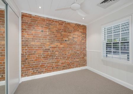 Executive Living at Its Finest - Renovated Two-Bedroom Cottage - Photo 2