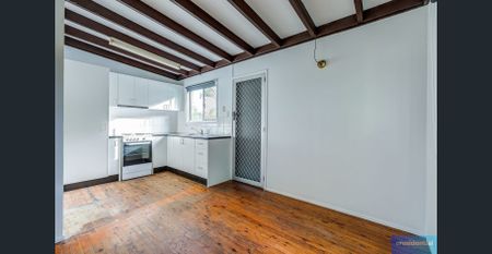 🏡 Spacious Dual-Level Family Home with Room for Everyone! - Photo 5