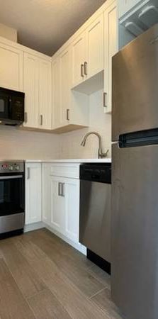 Tiny Condo Under 300SQFT / Murphy Bed Included / Single Occupant Only - Photo 1