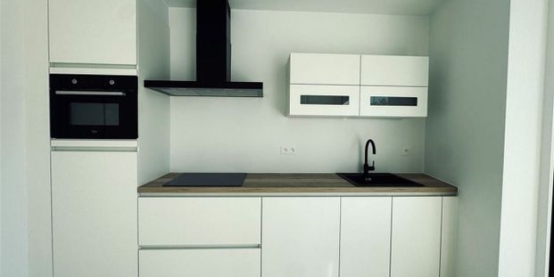 Appartement te huur in Beveren-Waas voor € 775 met 1 slaapkamer - Photo 1