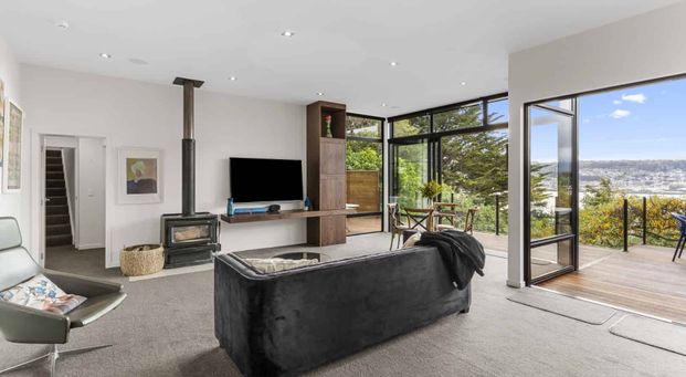 Stunning Executive Home with Harbour Views in Bush Clad Setting - Photo 1