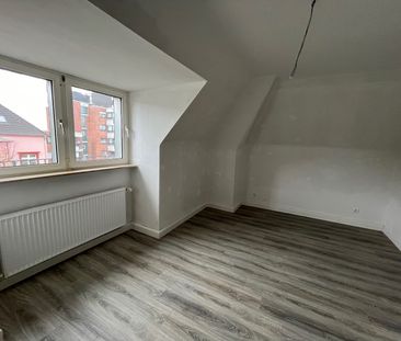 Zentrale Dachgeschosswohnung in Krefeld! - Photo 2