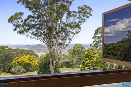 Elevate Your Lifestyle: Stunning Rangeville Home with Panoramic Views and Resort-Style Pool - Photo 4