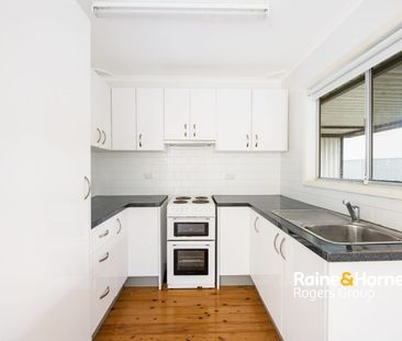 Comfortable Three-Bedroom Home in a Lakeside Location - Photo 3