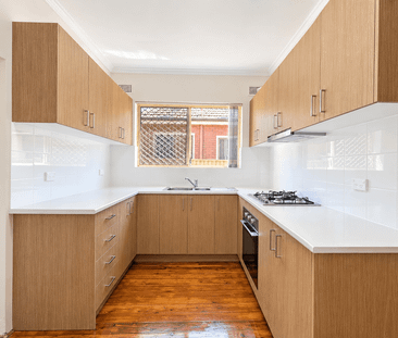 Modern 2-Bedroom Unit in Convenient Location - Photo 4
