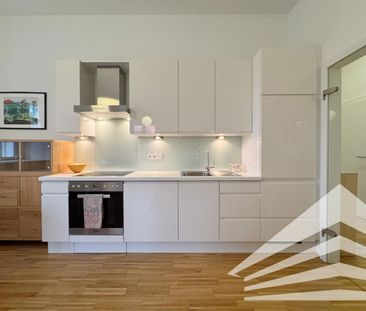 Stilvolle 2 Zimmer-Altbauwohnung mit Küche an der Donaulände - Photo 4