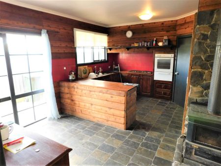 RURAL LIVING ON APPROX. 1.5 ACRES WITH TWO LIVING AREAS, ELECTRICITY & WATER INCLUDED IN RENT - Photo 5