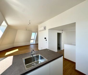 Hochwertige 1-Zimmer-Maisonette-Wohnung im Dachgeschoss mit Terrass... - Foto 1