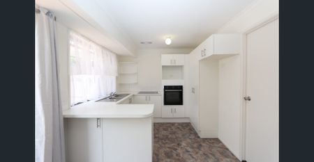 Spotless Duplex with Huge Fenced Backyard! - Photo 5