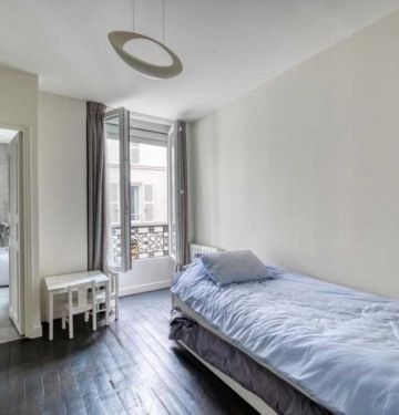 Appartement • Paris 4ème - Photo 4