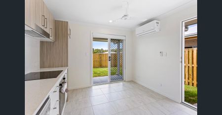 LOW MAINTENANCE AND MODERN 2 BEDROOM HOME WITH AIR CON AVAILABLE SOON! - Photo 3