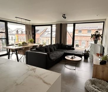 Prachtig hoek-appartement op de tweede verdieping met 2 slaapkamers in hartje Bilzen - Photo 4
