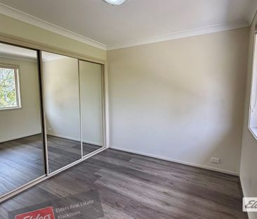 Located: Walking Distance to Quakers Hill Station: NO CARPETS - Photo 2