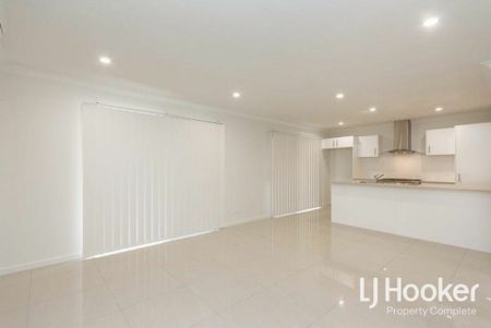 Modern Family Home with Stylish Finishes & Low-Maintenance Living - Photo 2