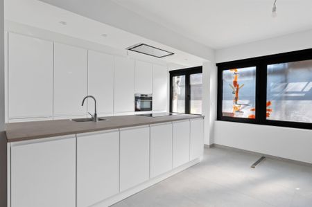 Energiezuinig BEN-appartement Vernieuwd 2-slaapkamerappartement met garagebox en zonnepanelen! - Photo 3