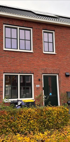 Leuk gelegen tussenwoning met 3 slaapkamers. - Foto 1