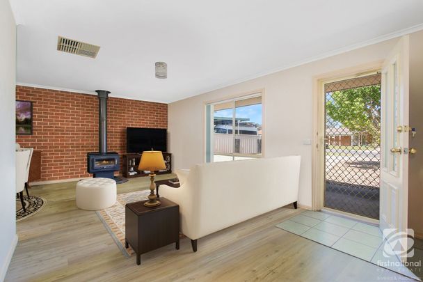 COMFORTABLE FAMILY HOME - Photo 1