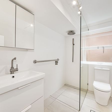 Renovated Two Bedroom Duplex in Convenient Location - Photo 4