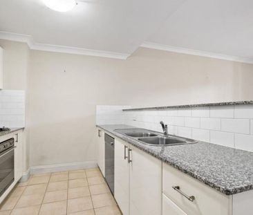 Spacious Two Bedroom Apartment in Sought After Complex - Photo 1