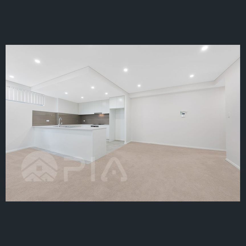 SPACIOUS TWO BEDROOM APARTMENT WITH LARGE COVERED BALCONY - Photo 1