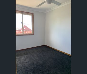 NEAT AND TIDY THREE BEDROOM HOME - Photo 6