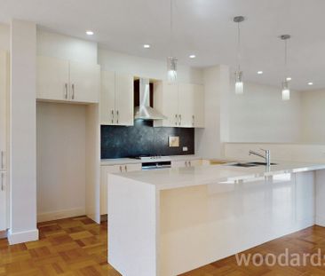 Freshly Painted and Renovated Home with Modern Features - Photo 6