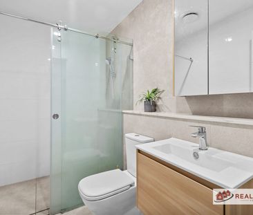 Stylish Near-New Apartment in the Heart of Schofields - Photo 4