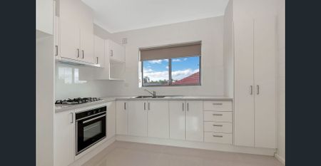 Nicely renovated, clean & spacious two bedroom unit! - Photo 5