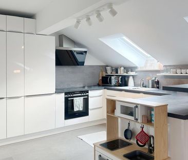 4-Zimmer-Dachgeschosswohnung mit Süd-West Balkon in Oberhaching - Photo 2