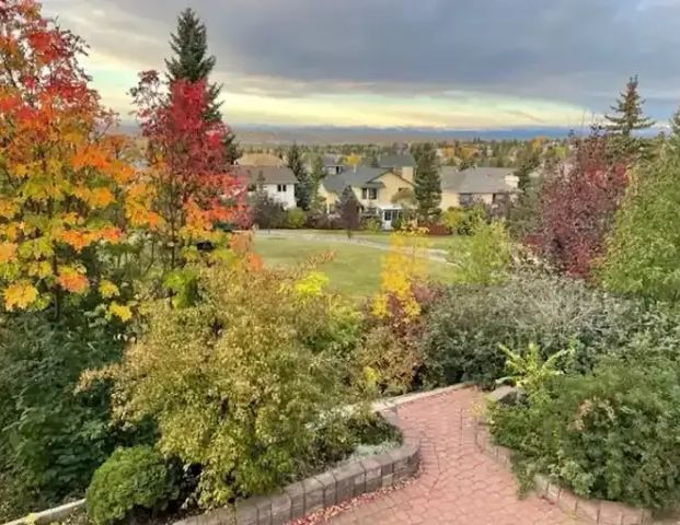 Entire 2 Bedrooms Walkout Basement Suite with Beautiful Mountain View | Calgary - Photo 1