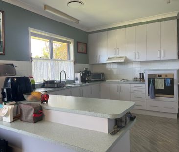 This Great Family Home is in a Good Location. - Photo 4