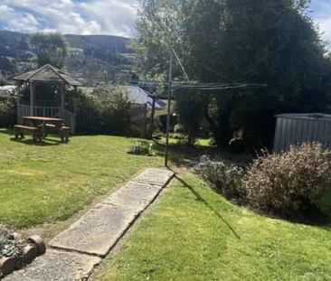 Bright 2-Bedroom Home in Wakari - Photo 2