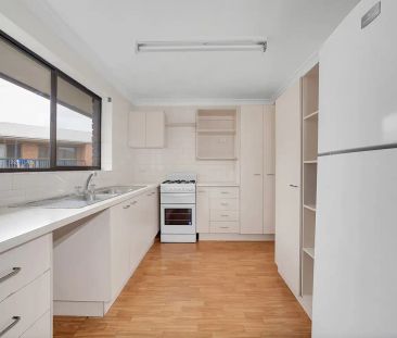 “Neat & Tidy Partly Furnished Unit in Ultra Convenient Location!” - Photo 3