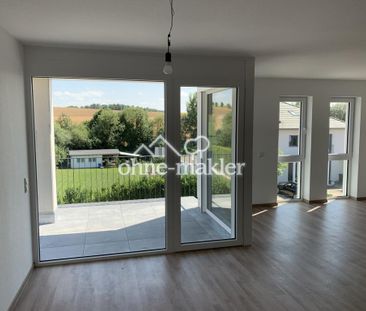 Neubau: 3-Zimmer-Wohnung mit Garten & Balkon, tollem Ausblick und E... - Foto 1
