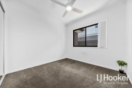 Modern Family Home with Side Access - Photo 4