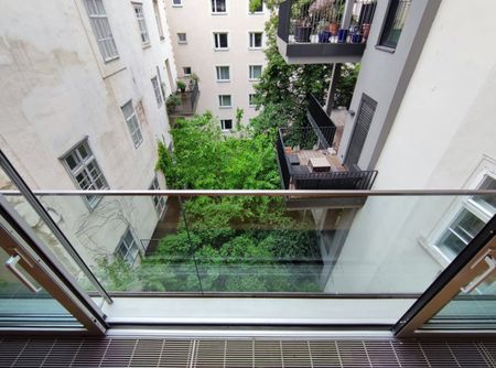 Innenstadt-Wohnung mit begrüntem Innenhof - Foto 5