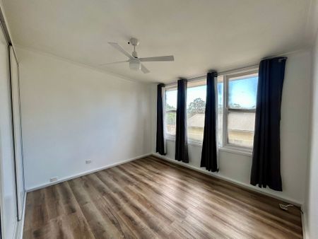 FRESHLY UPDATED HOME IN A FAMILY-FRIENDLY LOCATION - Photo 3