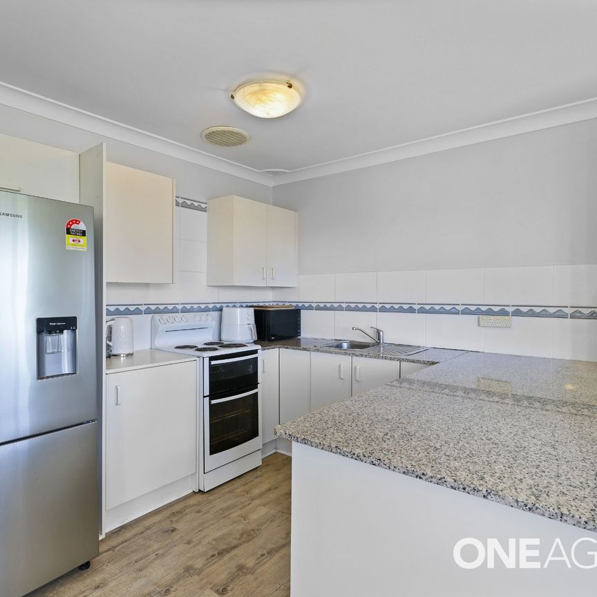 LIGHT-FILLED 2-BEDROOM UNIT - Photo 1