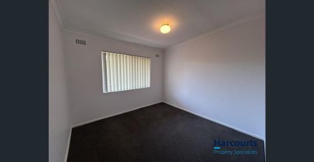 Comfortable Upstairs Unit in a Convenient Location - Photo 4