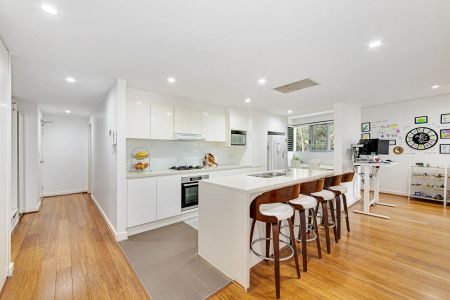 Expansive and Stunning Three Bedroom Unit in Highly Sought-After Complex - Photo 4