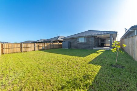 Family Home in the Heart of Chisholm - Photo 3