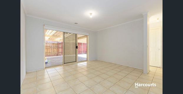 Large Family Home with Secure Yard & Multiple Living Areas! - Photo 1