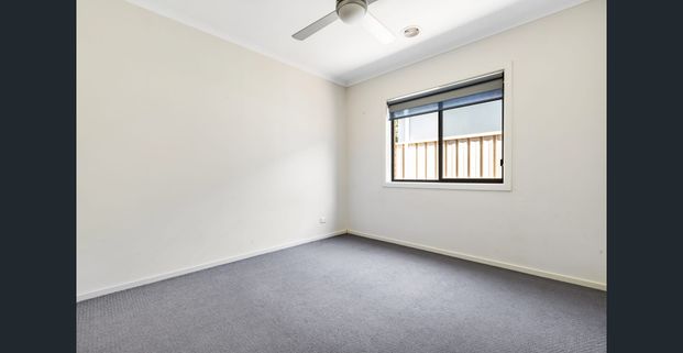 Spacious 4-Bedroom Home in Prime Location - Photo 1