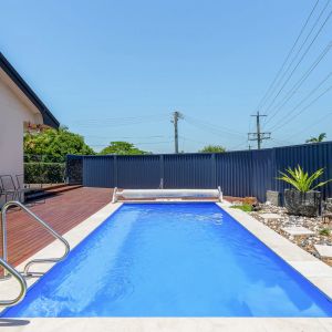 Beautifully Refreshed Family Home with Pool, Deck & Modern Comfort - Photo 2