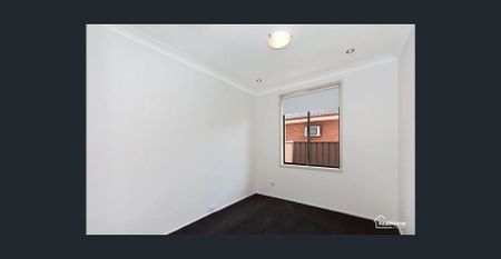 Charming Family Home with Spacious Yard in Prime Quakers Hill Location - Photo 3