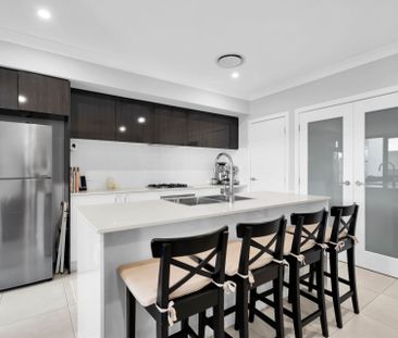 Four-bedroom terrace with practical layout - Photo 4